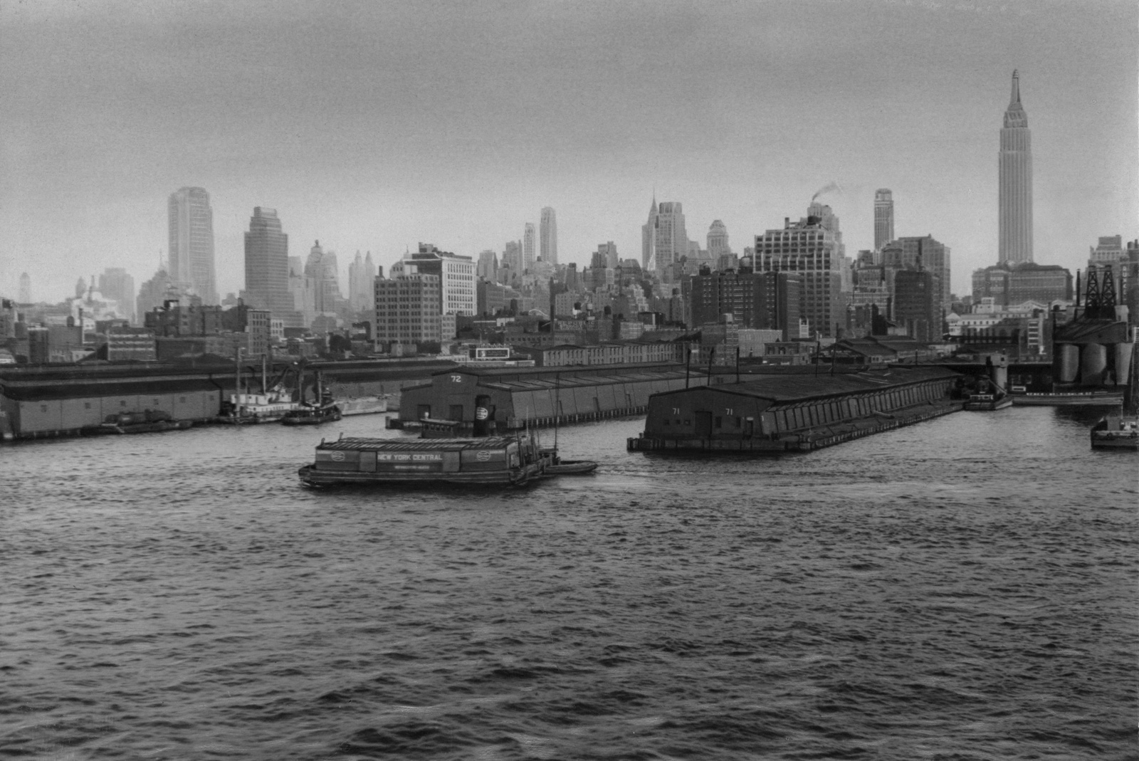 Photograph by Ilf of a harbor in New York City, circa nineteen thirty-five.