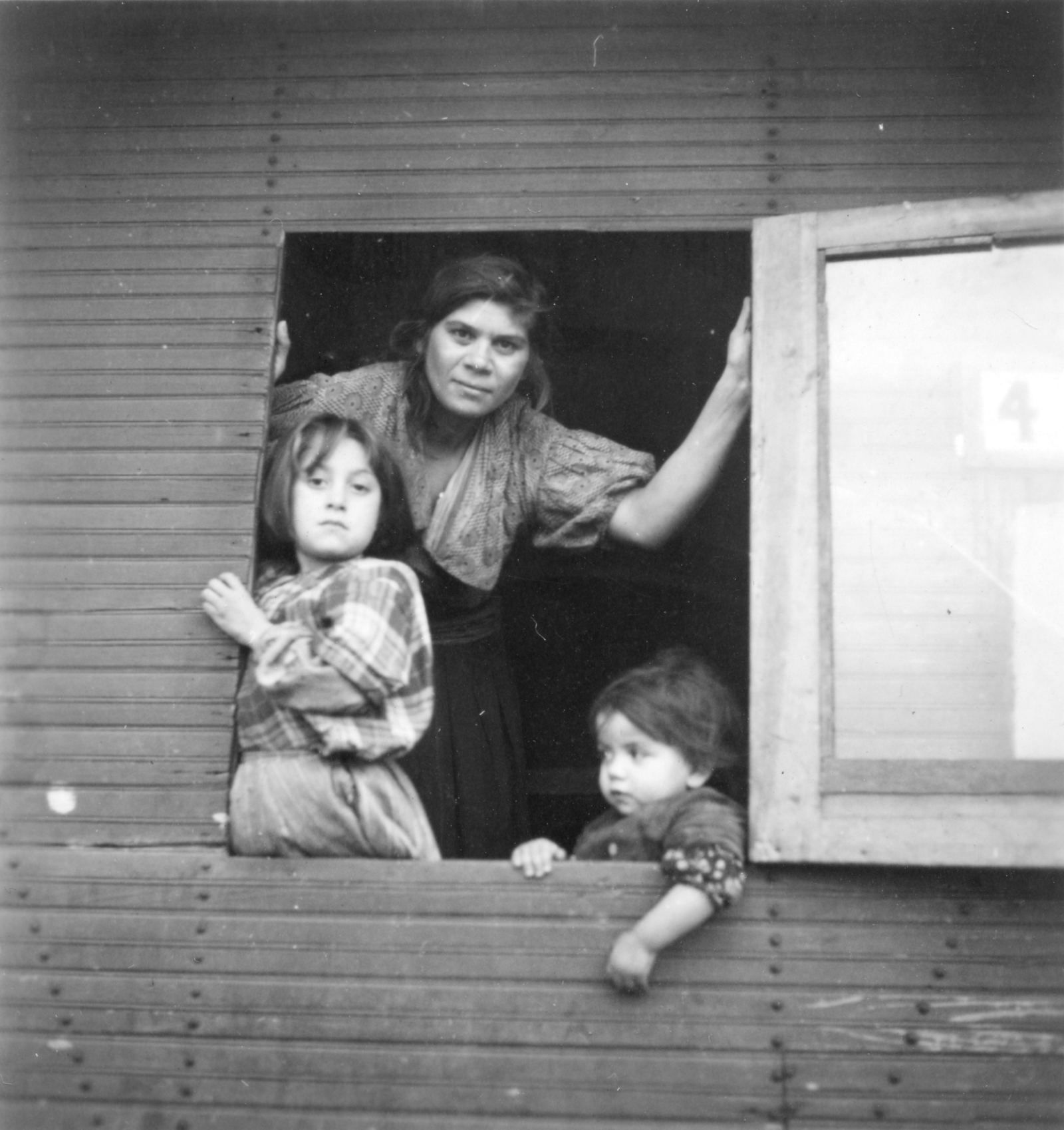 Romani woman and children at Berlin’s Marzahn labor camp for Sinti and Roma.