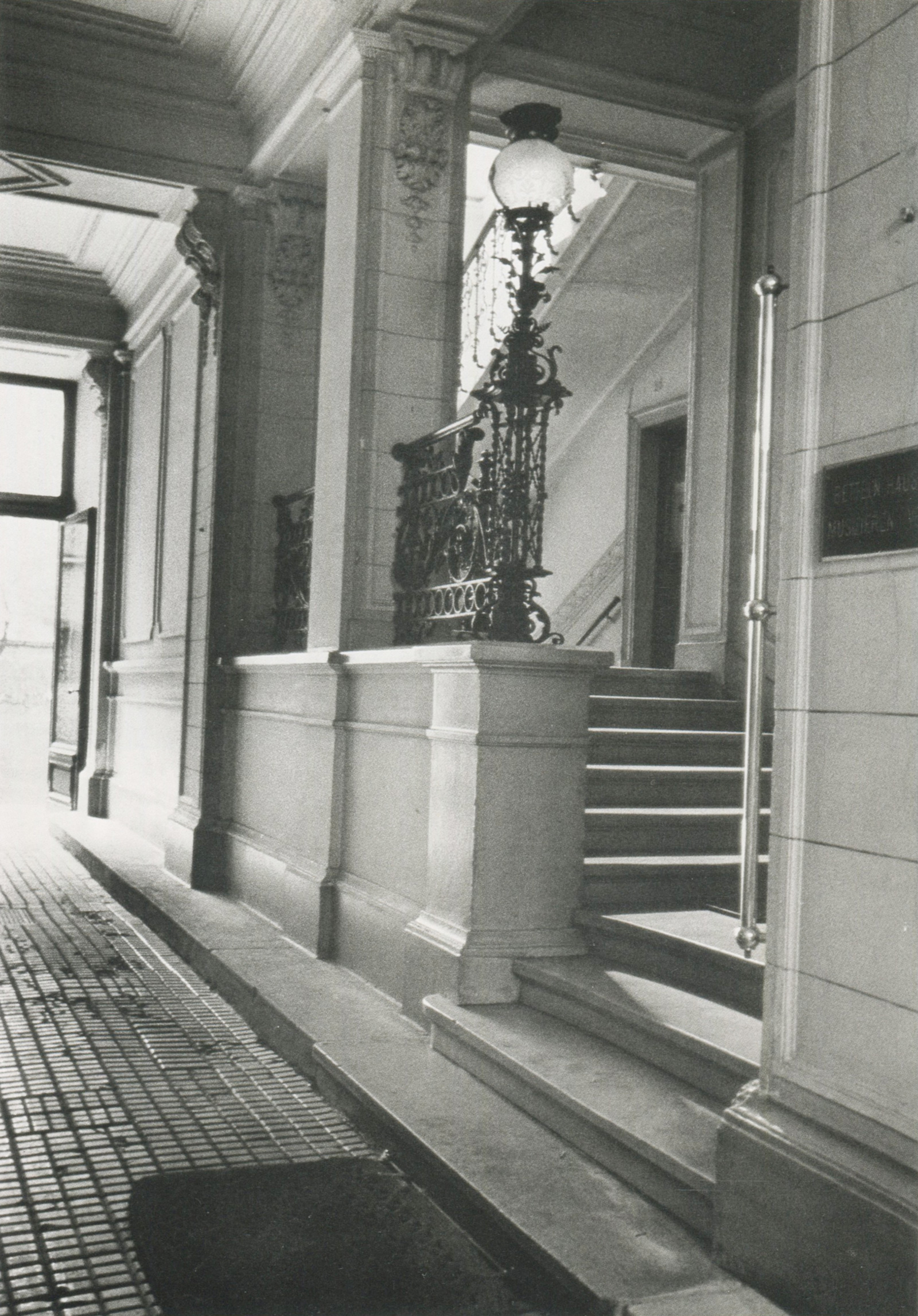 A photograph of the entranceway to the Freud apartment building.