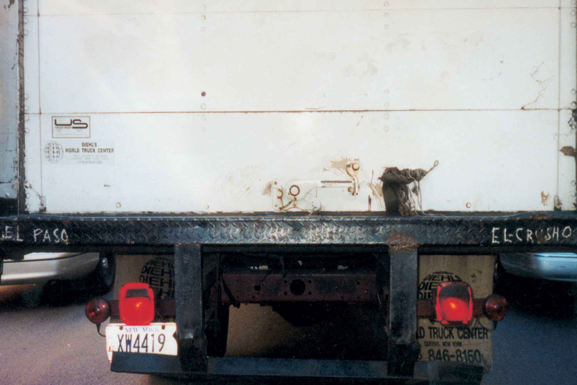 A photo by Joseph Fratesi of the back of a truck with the words 
