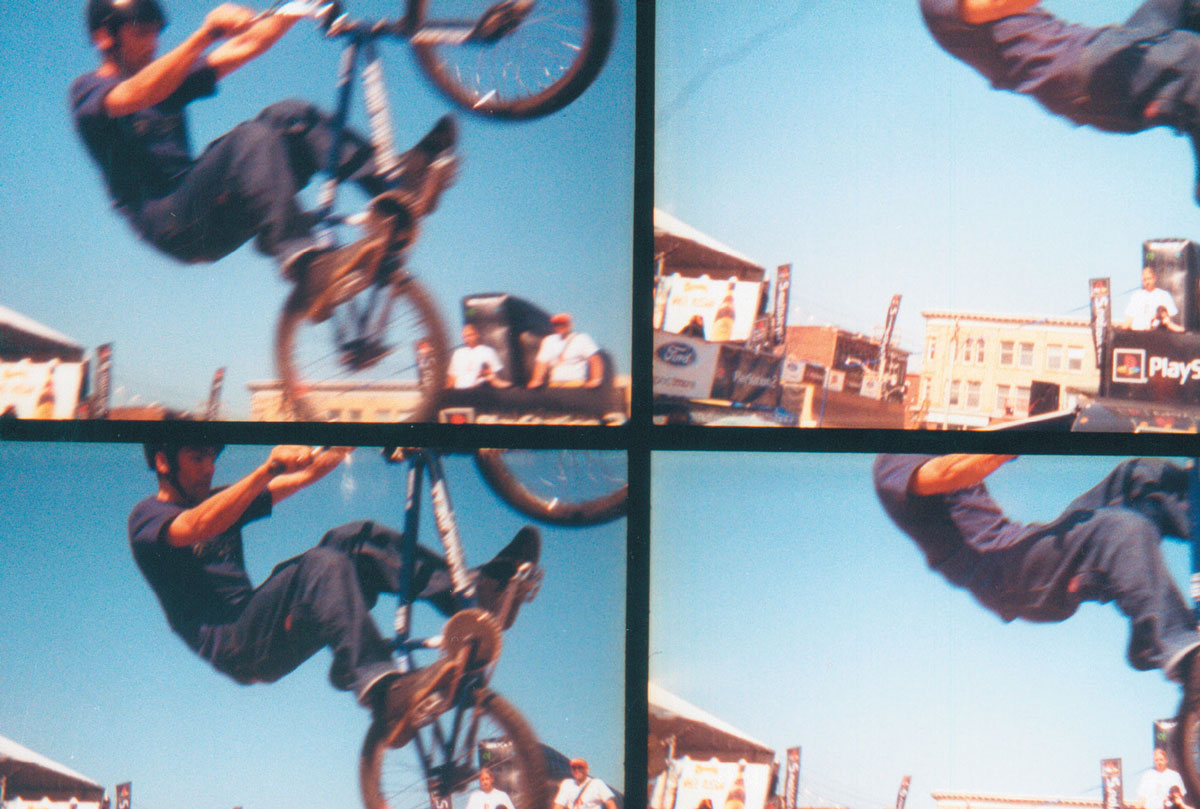 Four Lomographic images depicting a man riding a motocross bicycle.